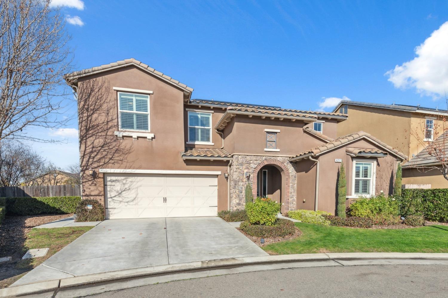 4217 Salem Lane Clovis, CA 93619 - Photo 3 of 57 a front view of a house with garden