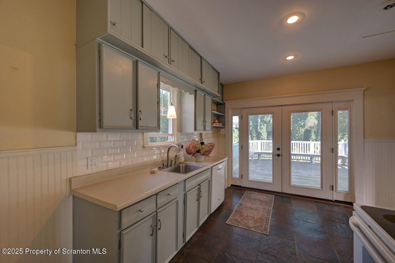 120 Glenburn Road Clarks Green, PA 18411 - Photo 19 of 34 a bathroom with a double vanity sink and a large mirror