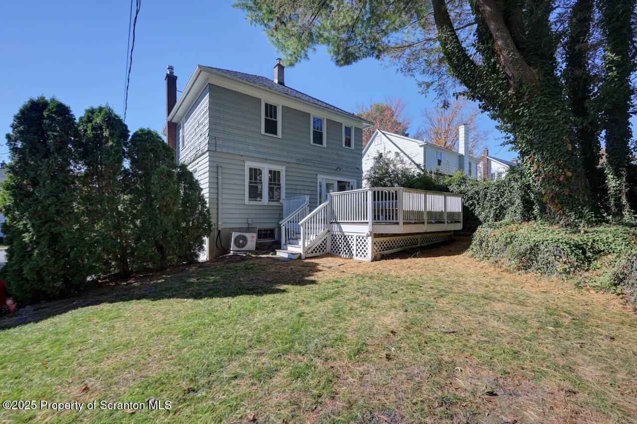120 Glenburn Road Clarks Green, PA 18411 - Photo 2 of 34 a front view of a house with a yard and garage