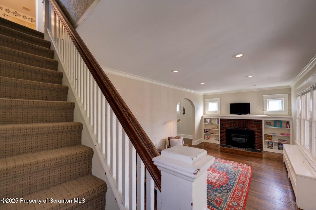 120 Glenburn Road Clarks Green, PA 18411 - Photo 22 of 34 a living room with furniture and a fireplace