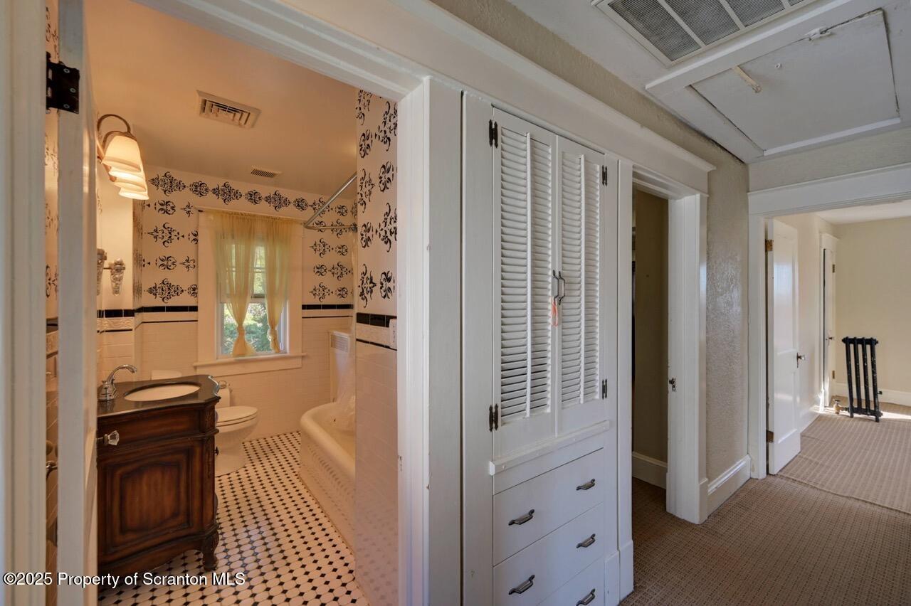 120 Glenburn Road Clarks Green, PA 18411 - Photo 23 of 34 a view of a hallway with a dining table and chairs