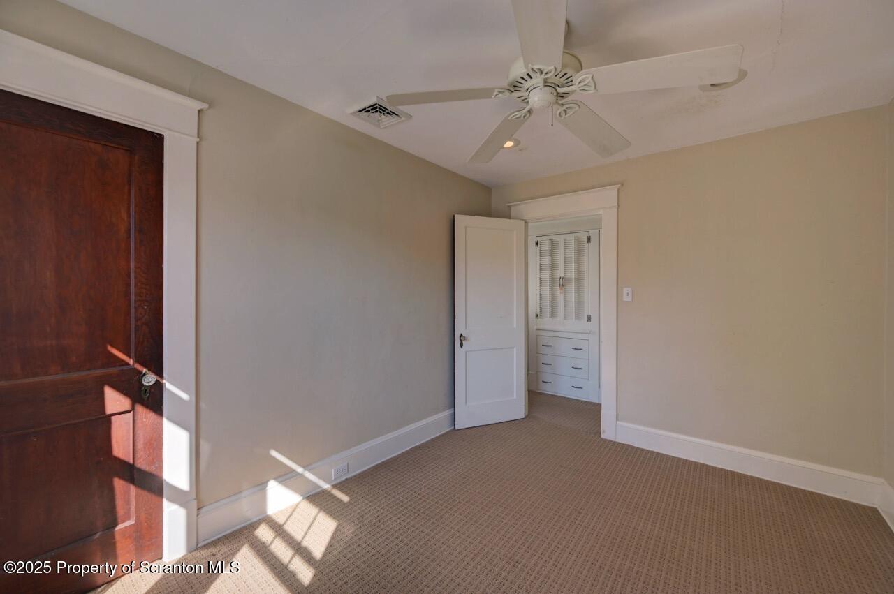 120 Glenburn Road Clarks Green, PA 18411 - Photo 25 of 34 a view of an empty room with a window