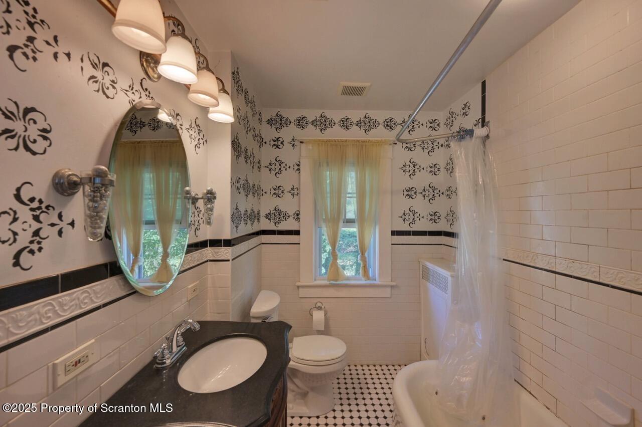 120 Glenburn Road Clarks Green, PA 18411 - Photo 27 of 34 a bathroom with a sink toilet and shower