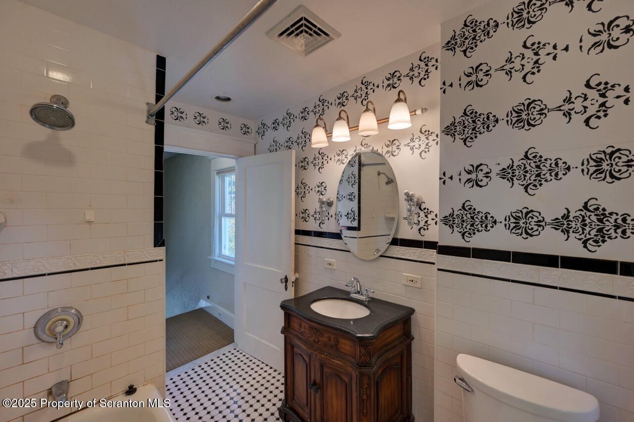120 Glenburn Road Clarks Green, PA 18411 - Photo 28 of 34 a bathroom with a sink a toilet and shower
