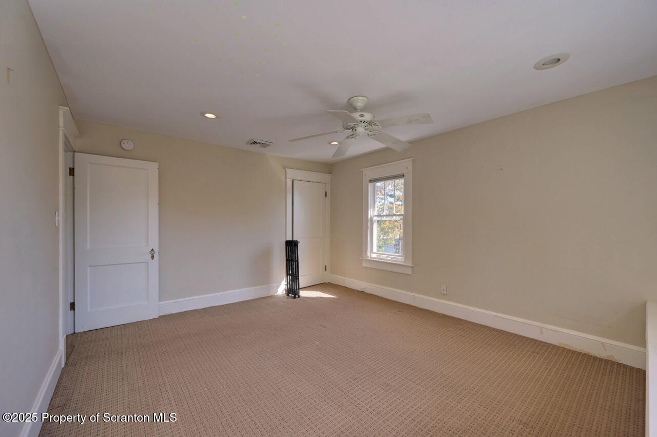 120 Glenburn Road Clarks Green, PA 18411 - Photo 31 of 34 a view of an empty room with a window
