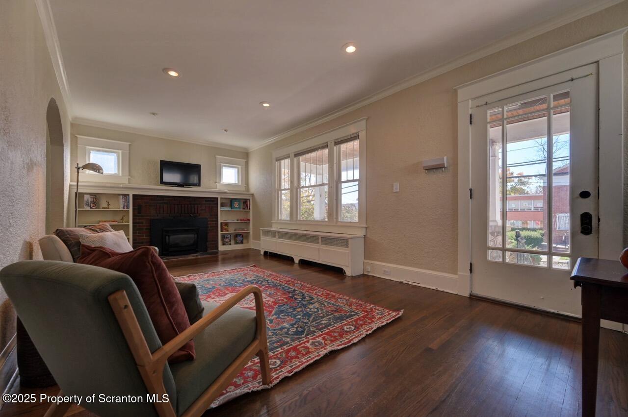 120 Glenburn Road Clarks Green, PA 18411 - Photo 7 of 34 a living room with furniture window and a fireplace