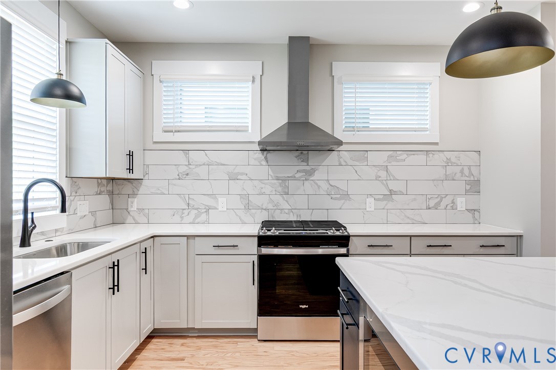 2917 R Street Richmond, VA 23223 - Photo 11 of 35 Kitchen featuring pendant lighting, stainless stee