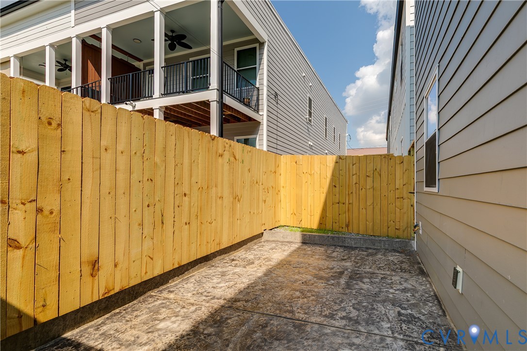 2917 R Street Richmond, VA 23223 - Photo 15 of 35 View of yard featuring a patio and ceiling fan
