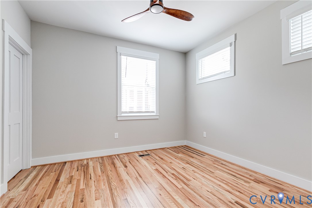 2917 R Street Richmond, VA 23223 - Photo 23 of 35 Unfurnished bedroom with light wood-style flooring