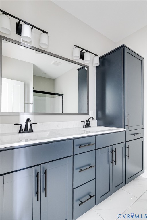 2917 R Street Richmond, VA 23223 - Photo 26 of 35 Full bathroom with double vanity