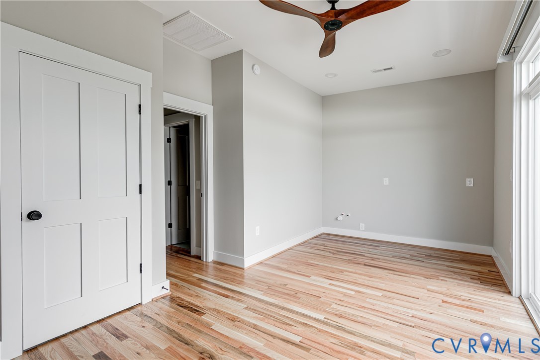 2917 R Street Richmond, VA 23223 - Photo 28 of 35 Spare room with light wood finished floors and cei