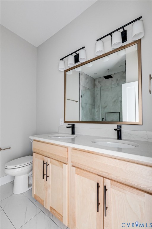 2917 R Street Richmond, VA 23223 - Photo 31 of 35 Full bath with double vanity and a marble finish s