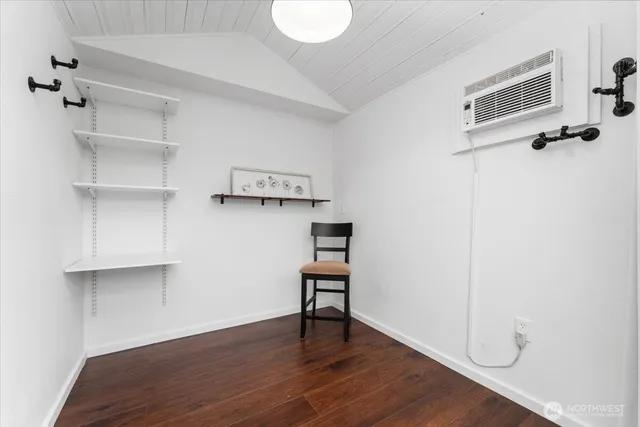 a view of a room with racks on the wall