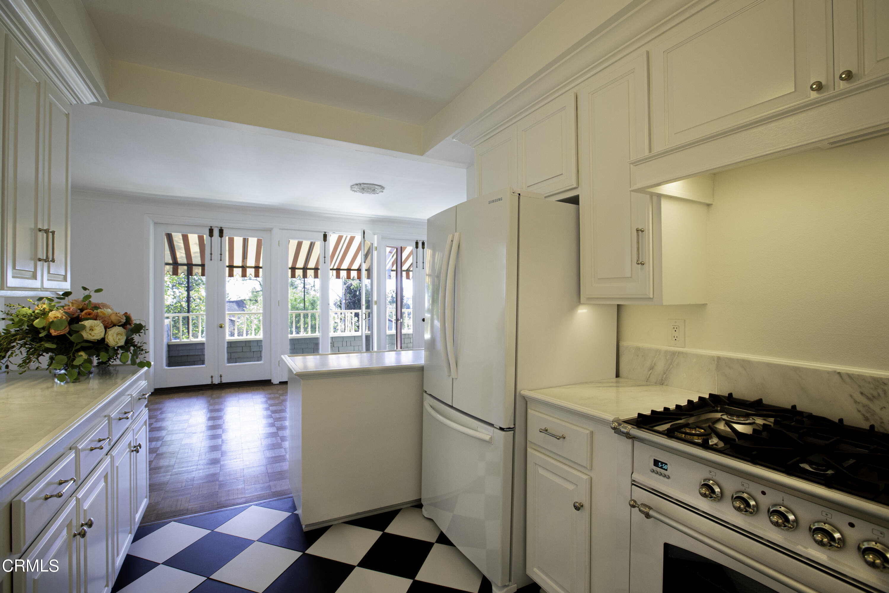 80 Grace Terrace, Unit 5 Pasadena, CA 91105 - Photo 17 of 52 a kitchen with stainless steel appliances granite countertop a stove a sink and a refrigerator