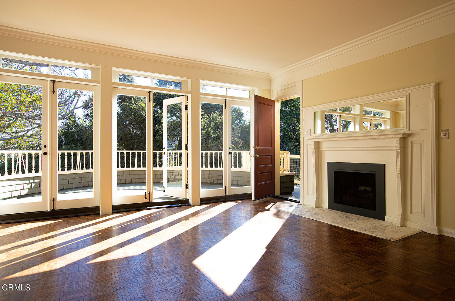 80 Grace Terrace, Unit 5 Pasadena, CA 91105 - Photo 20 of 52 a view of a livingroom with wooden floor and a fireplace