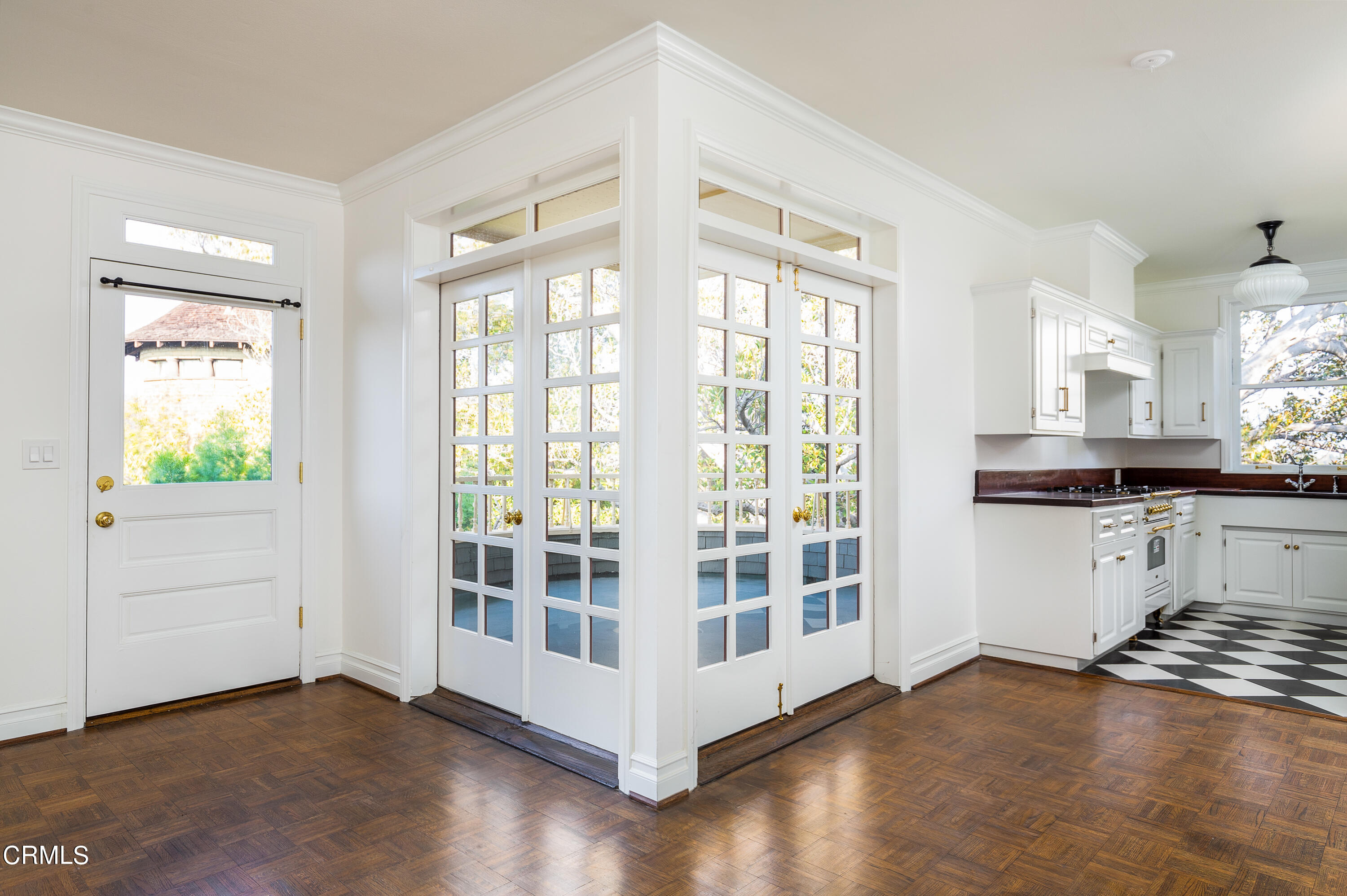 80 Grace Terrace, Unit 5 Pasadena, CA 91105 - Photo 29 of 52 a view of a large kitchen with stainless steel appliances wooden floor and a window