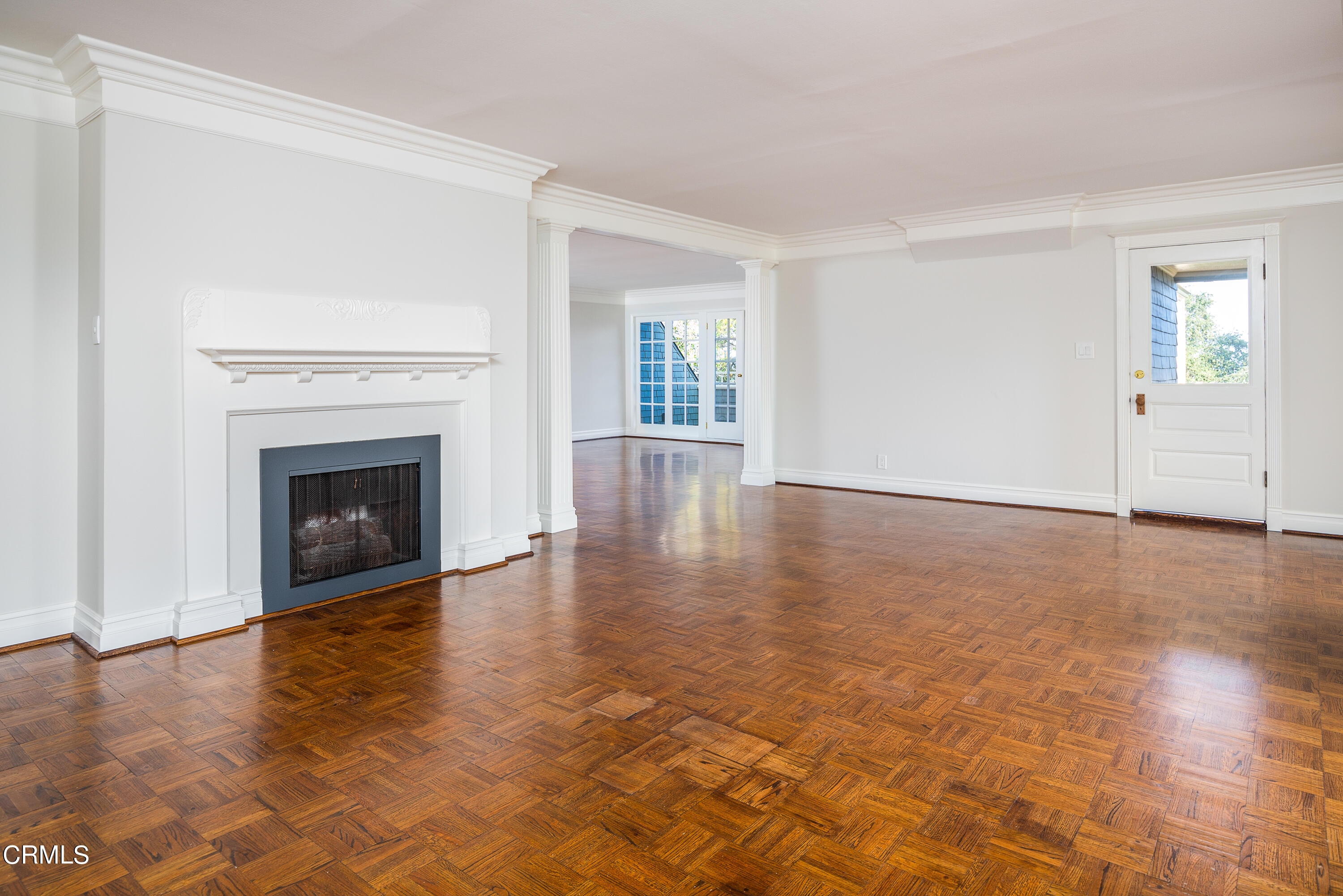 80 Grace Terrace, Unit 5 Pasadena, CA 91105 - Photo 35 of 52 a view of a livingroom with wooden floor and a fireplace