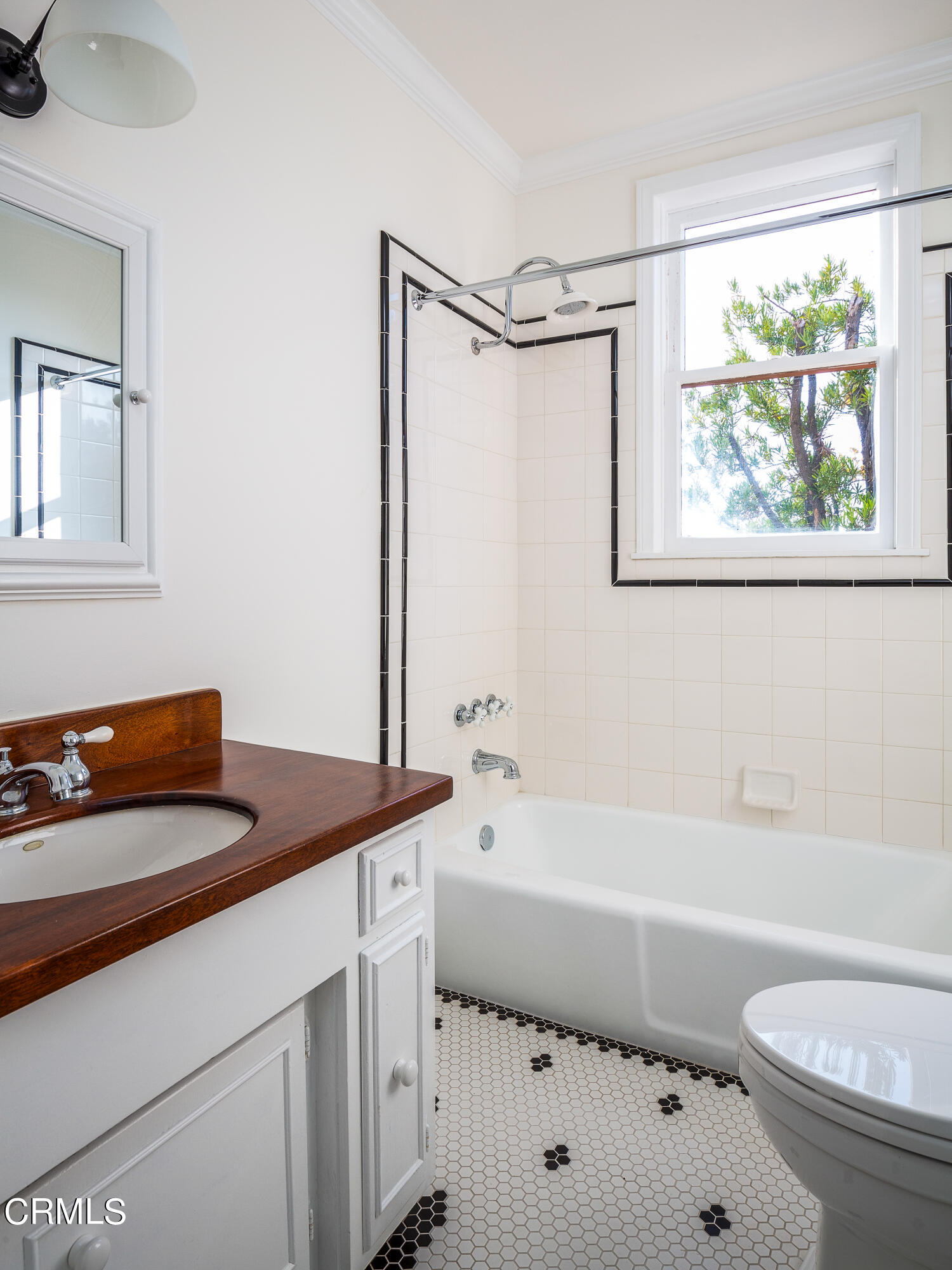 80 Grace Terrace, Unit 5 Pasadena, CA 91105 - Photo 38 of 52 a bathroom with a sink a toilet a vanity and bathtub