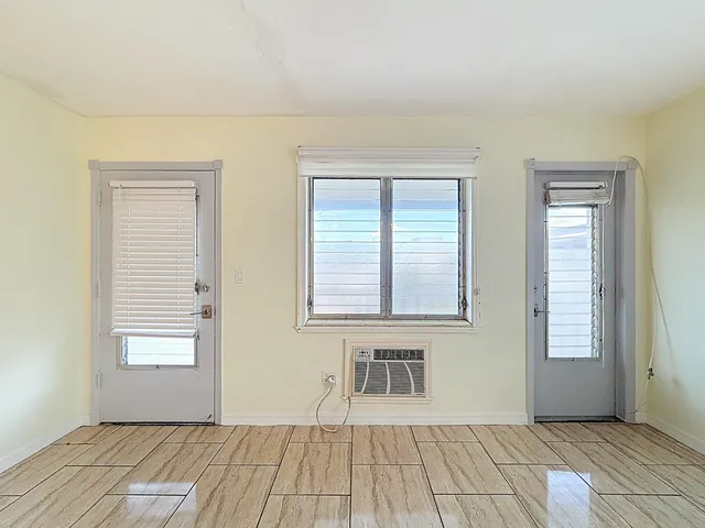 a view of an empty room with window