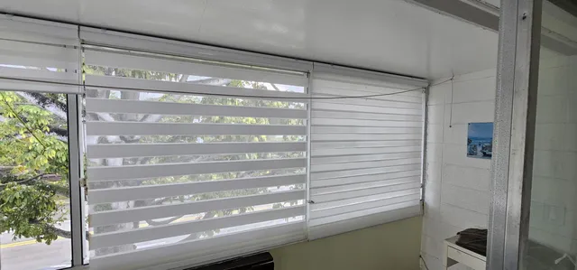 a view of a door and a window