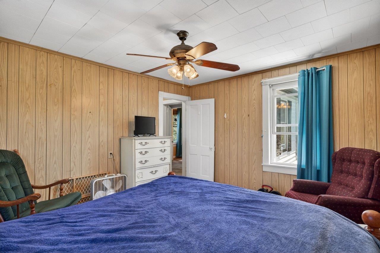 724 Newtown Road Elkton, VA 22827 - Photo 23 of 38 a bedroom with furniture and a window