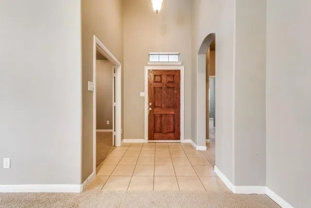a view of a hallway with entryway