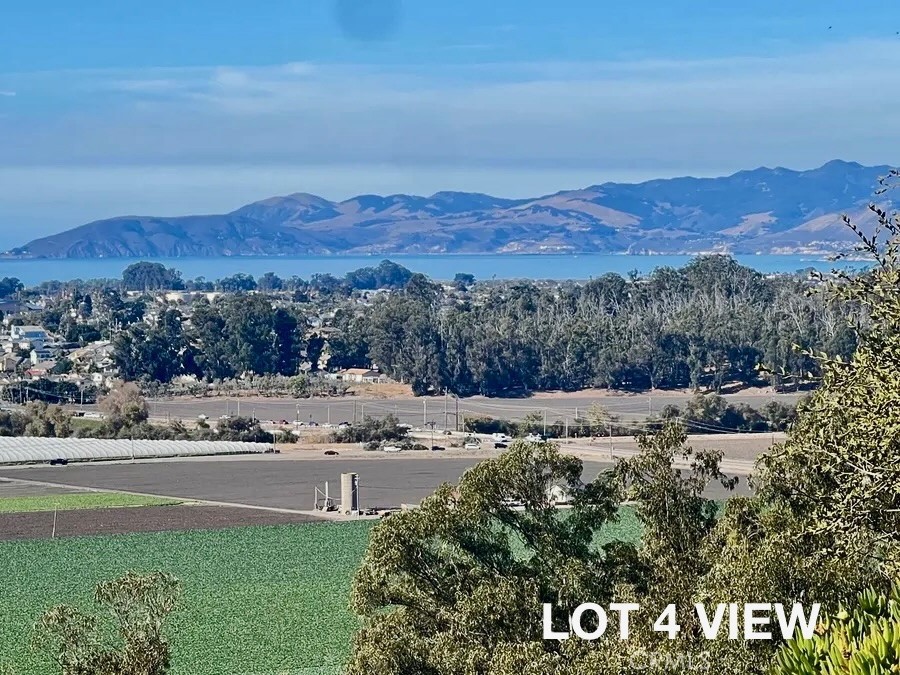 0 Castle Bluff Road Arroyo Grande, CA 93420 - Photo 29 of 36 a view of a town with mountains in the background