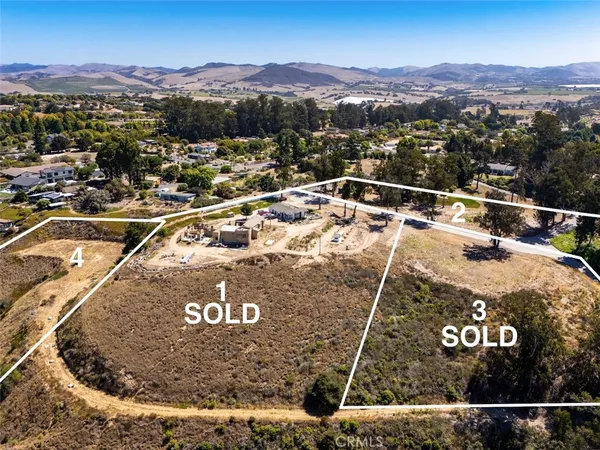 a view of an ocean and a building