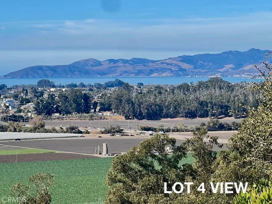 0 Castle Bluff Road Arroyo Grande, CA 93420 - Photo 35 of 36 a view of a town with mountains in the background