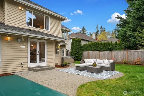 a view of a patio in backyard