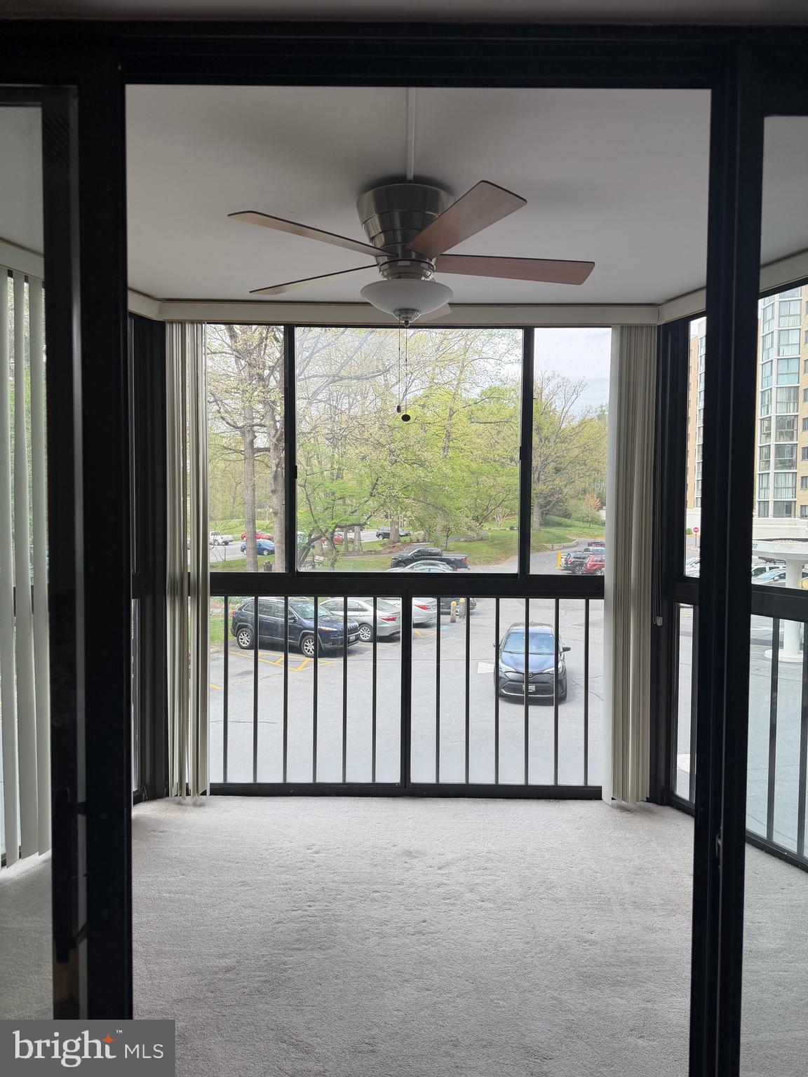 15107 Interlachen Drive, Unit 2119 Silver Spring, MD 20906 - Photo 19 of 27 Balcony with Ceiling Fan