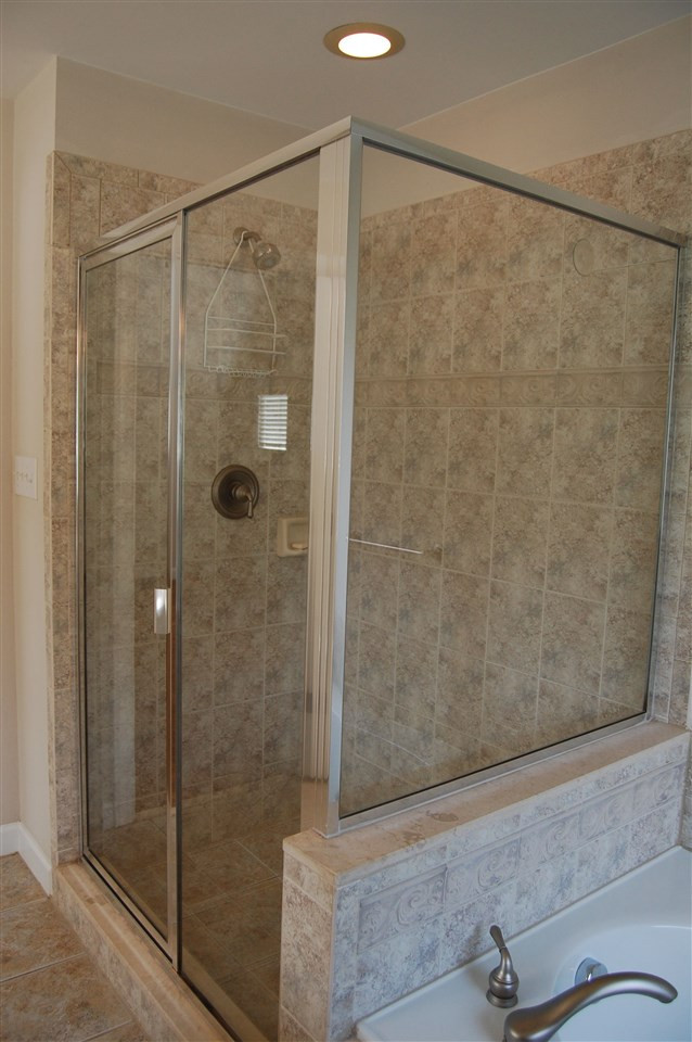 840 Nowell Ridge Road Raleigh, NC 27607 - Photo 13 of 25 MBA shower close up view showering glass, tile work & fixtures! Master Bath/Spa