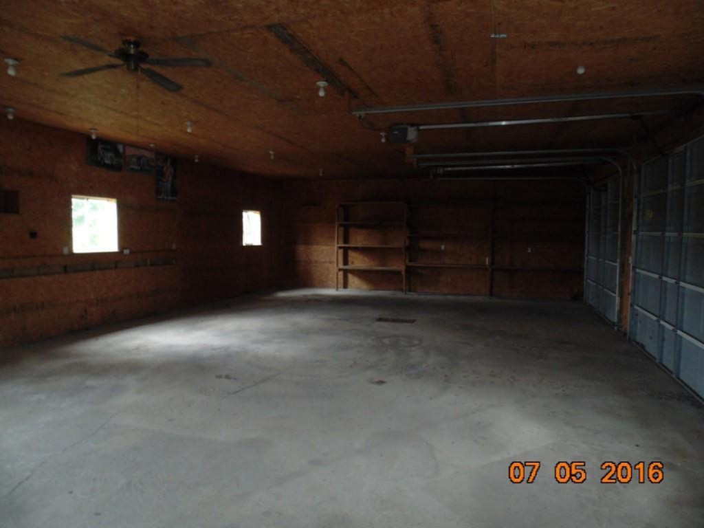 7485 West 48 Road Cadillac, MI 49601 - Photo 8 of 14 garage interior