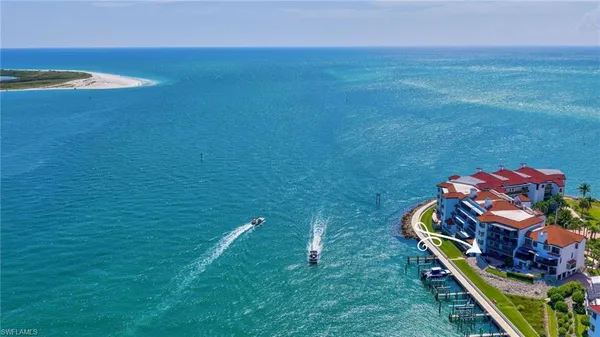 $945,000 | 504 La Peninsula Boulevard, Unit 504, Naples, FL 34113