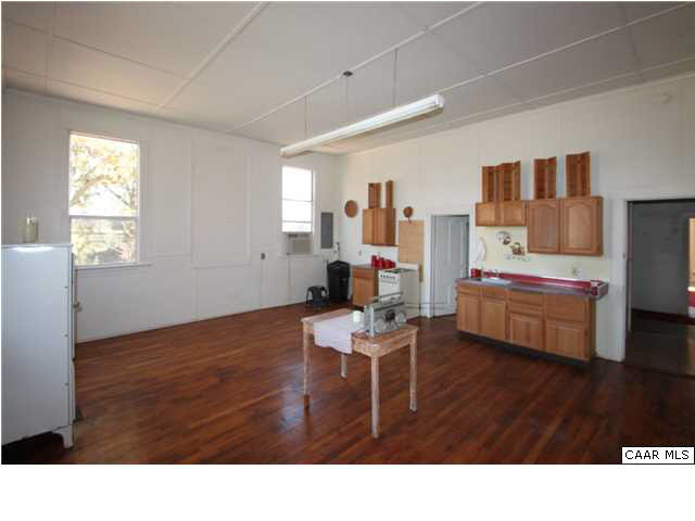 4805 Orange Road Aroda, VA 22709 - Photo 6 of 12 a living room with furniture and a flat screen tv