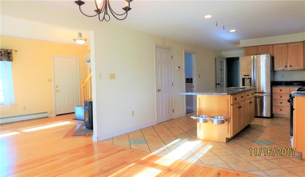 191 Edes Falls Road Naples, ME 04055 - Photo 7 of 33 Kitchen and dining area open to the...