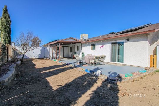 324 Sims Street Ridgecrest, CA 93555 - Photo 36 of 40 a view of a house with backyard and sitting area