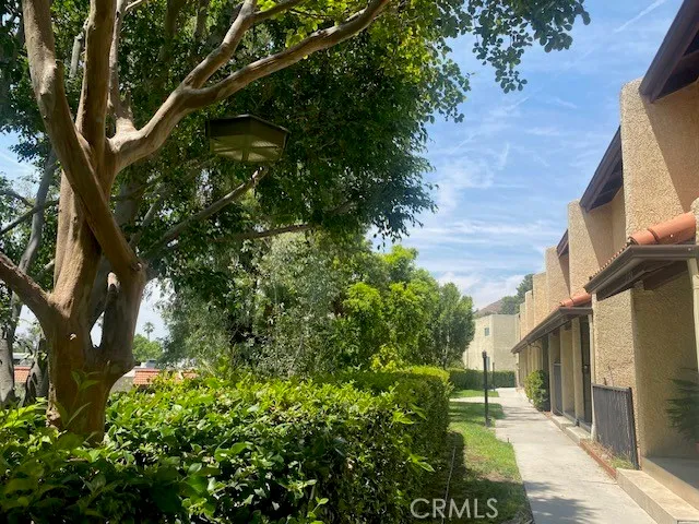 a backyard of a house with lots of green space