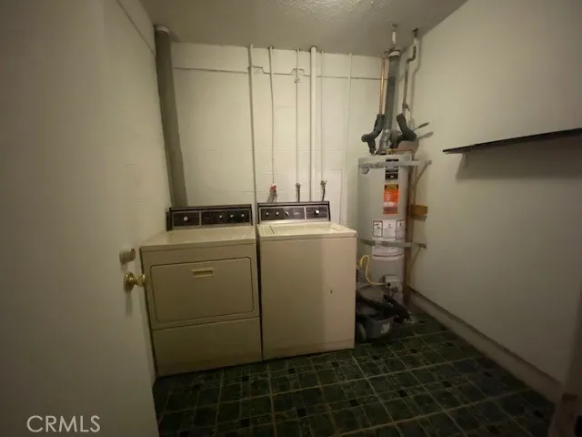a view of a kitchen with a sink