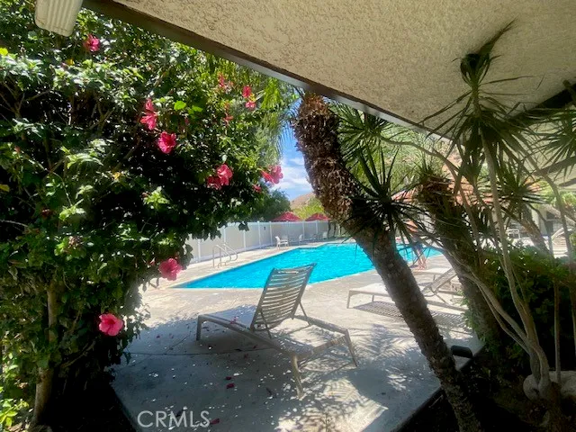 a view of a park that has a sign board