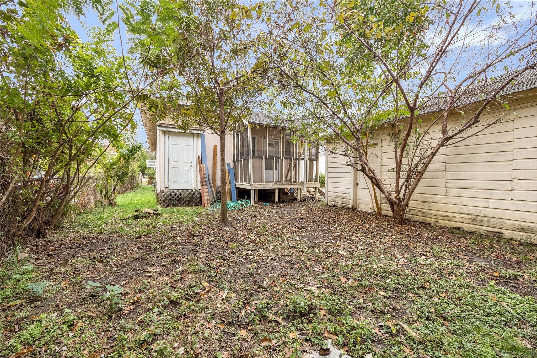 2909 Sherman Street Houston, TX 77003 - Photo 8 of 9 a front view of a house with a garden