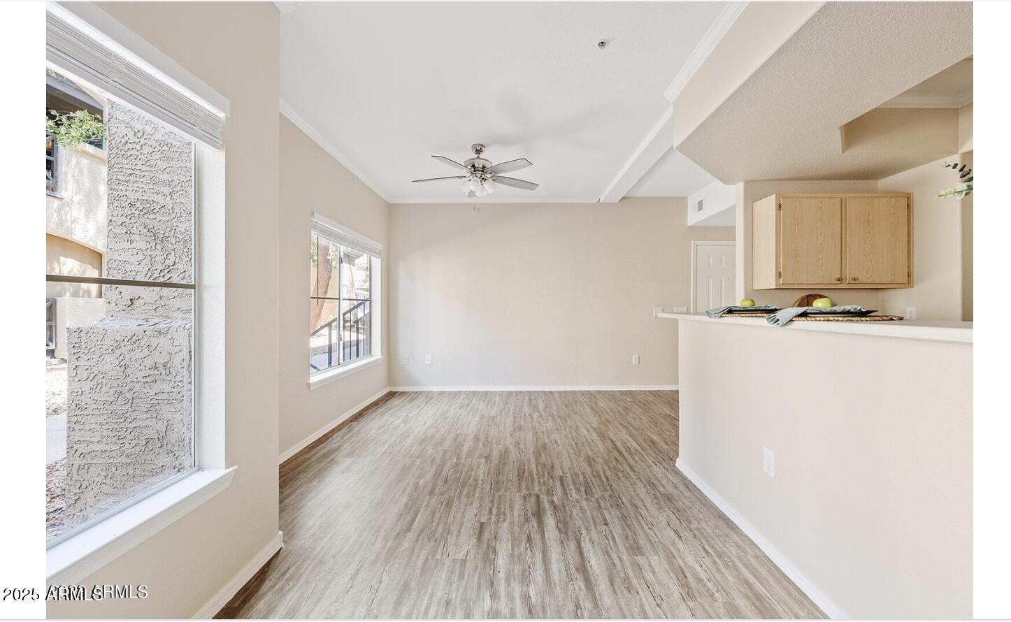 3236 East Chandler Boulevard, Unit 1079 Phoenix, AZ 85048 - Photo 7 of 17 a view of kitchen with sink and wooden floor