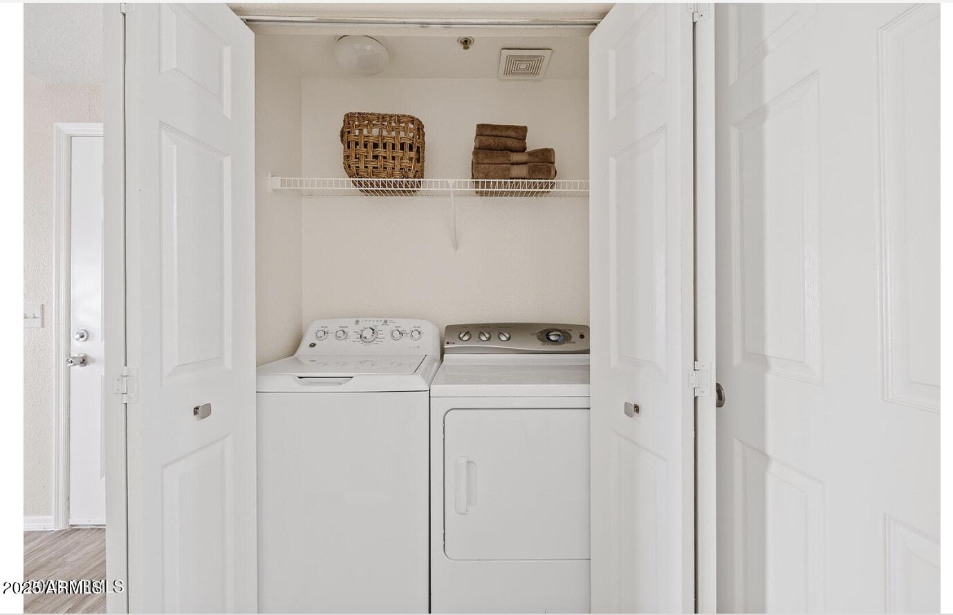 3236 East Chandler Boulevard, Unit 1079 Phoenix, AZ 85048 - Photo 9 of 17 a view of washer and dryer