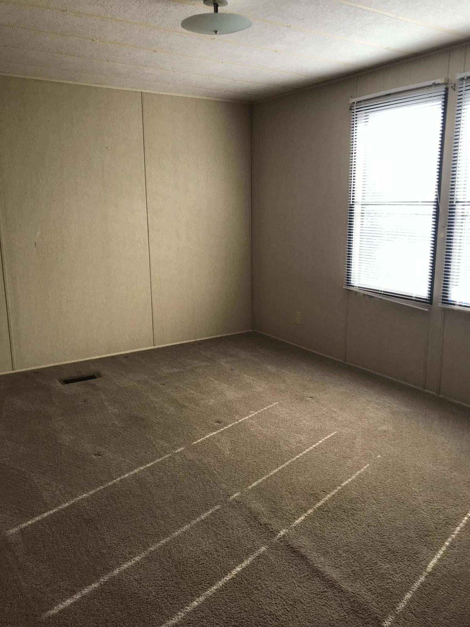 2321 Navigation Point Goodview, VA 24095 - Photo 13 of 26 a view of an empty room with a window