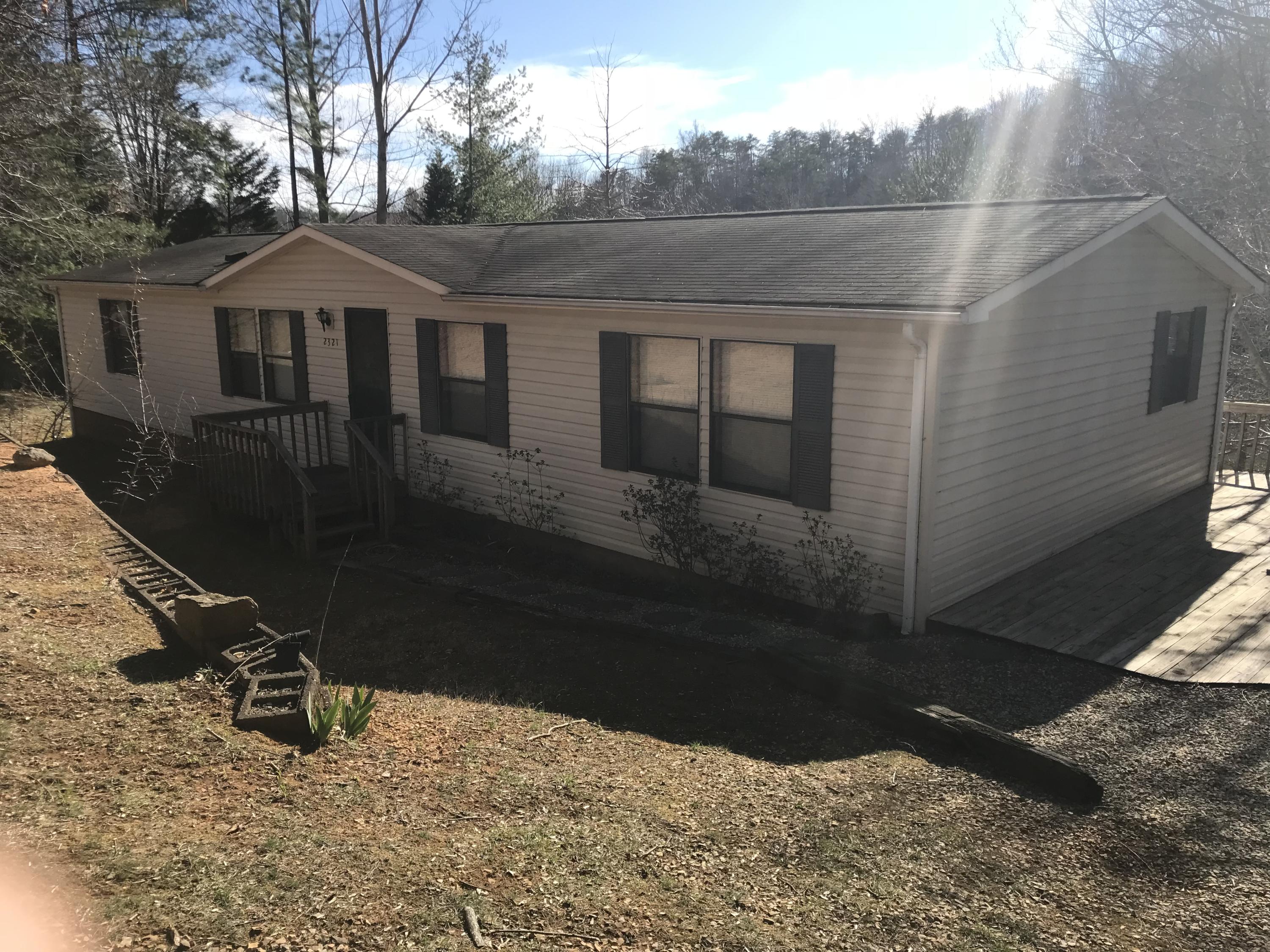 2321 Navigation Point Goodview, VA 24095 - Photo 22 of 26 a front view of a house with a yard