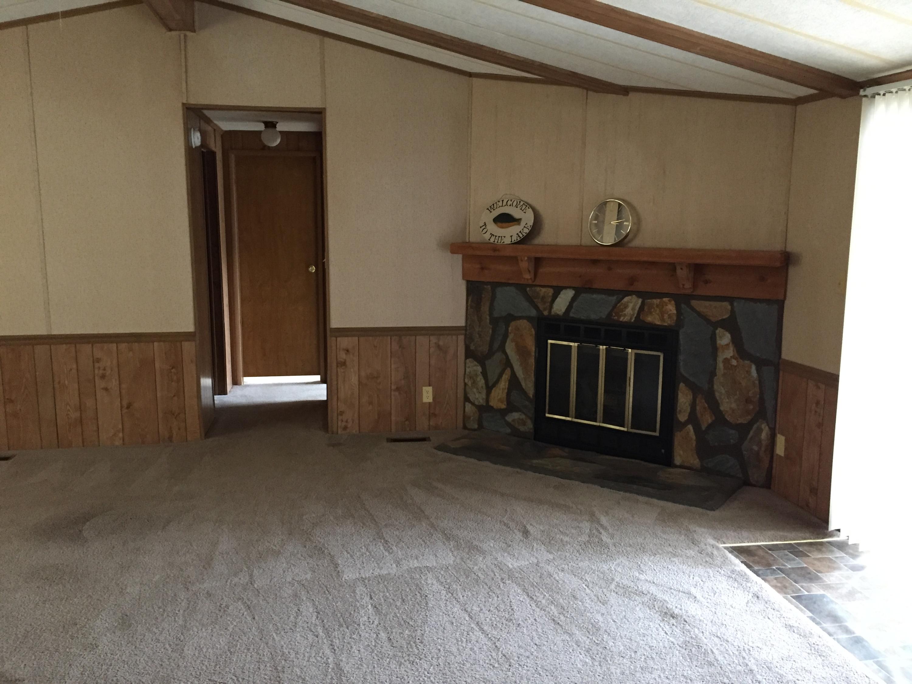 2321 Navigation Point Goodview, VA 24095 - Photo 6 of 26 a living room with a fireplace