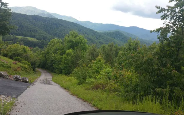 a view of a mountain with a outdoor space
