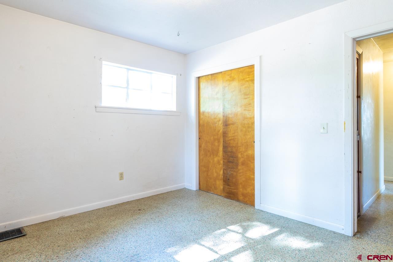 706 39 Road Palisade, CO 81526 - Photo 14 of 35 a view of an empty room and window