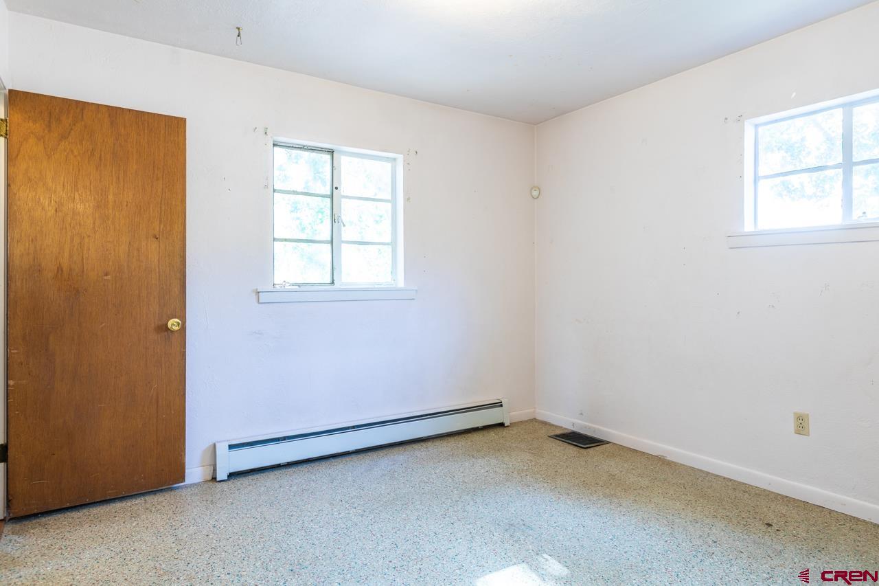 706 39 Road Palisade, CO 81526 - Photo 15 of 35 an empty room with windows