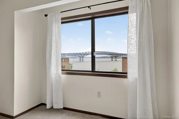a view of a large window with an outdoor space